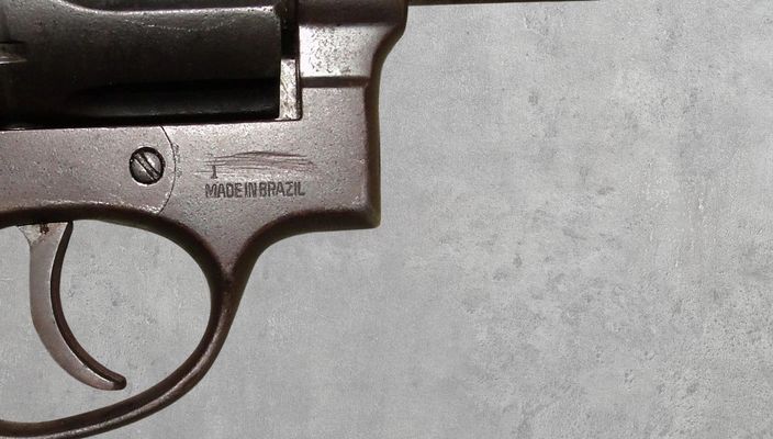 Capa da publicação Arma com numeração raspada não é crime hediondo